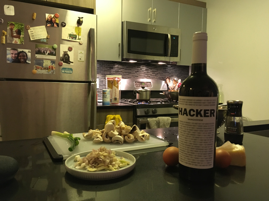 Hobbies & Interests - Cooking - Ingredients to a vegetarian meal in a modern kitchen and a bottle of wine.