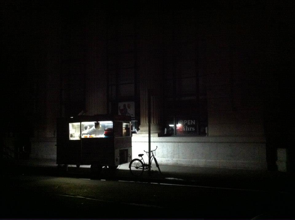 SoHo by night in the aftermath of Sandy 2012. The only light coming from a halal cart.